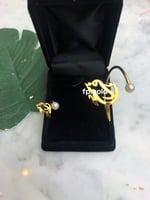 طقم قلاده وبروش الورده و اسواره وخاتم مطلي ذهب بال...