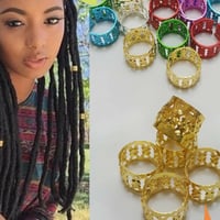 مساكات لزينة الشعر العدد تقريبا 50 قطعة او اقل حلق...