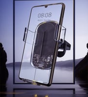 حامل جوال وشاحن لاسلكي 2 في 1