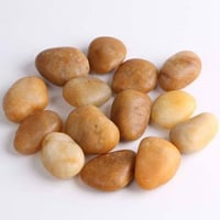 حجر طبيعي مطفي أصفر اللون 3-5 سم الوزن 10 كيلو