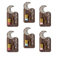 توزيعات مسك وعود شكل هلال بعبارة مبارك عليكم الشهر...