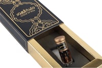 دهن عود تراد عسلي