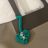 تعليقة قلب السيفين والنخلة