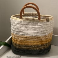 شنطة يد درجات البني