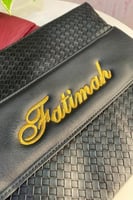 شنطة يد باوتش جلد محبب عودي 30 * 22 سم