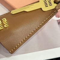 تعليقة شنطة ميوميو