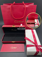 +60 Cartier accessories with a ribbon