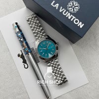 ساعة ماجلان مع قلم كارتير تيفاني غطاء