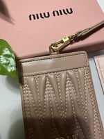 تعليقة بطايق ميو ميو بيج