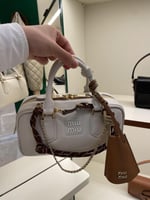 تعليقة شنطة ميوميو