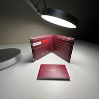 محفظة كارتير كبير باللون الأسود