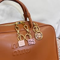 ميدالية ميو ميو 3 في 1