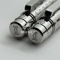 قلم كارتير سانتوس فضي على كحلي مزخرف