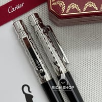 قلم كارتير سانتوس فضي على اسود مزخرف