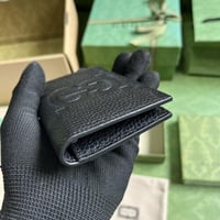 محفظة قوتشي بطايق