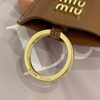 تعليقة شنطة ميوميو