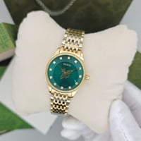 ساعة قوتشي النحلة