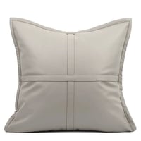 غطاء خدادية بيج بنسيج ناعم وحواف جلد رمادي