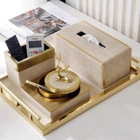 علبه مناديل بيج جلد بأطراف ذهبي