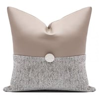 غطاء وسادة جلد بني وقماش رمادي