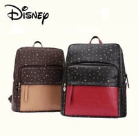 شنطة من ديزني جلد محفور عليها صورة (ميكي) او( ميني...