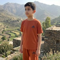 طقم "أورانج سبورتس" من adi