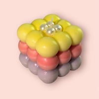 شمعة: “فقاعات الفن” (Artful Bubbles)