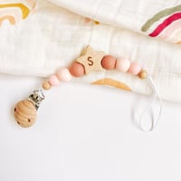 حامل مصاصة بالحرف