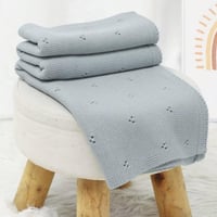 غطاء محبوك أزرق