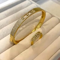 سوار مع خاتم بتصميم مستوحى من ميسيكا مطلي ذهب. MB-...