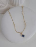 خلخال مع كرات ذهبية وعين زرقاء مطلي ذهب. MA-017