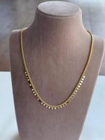 سلسال مطلي ذهب عيار ١٤ ناعم مع تعليقات بشكل دوائر...