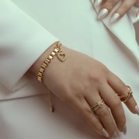 سوار جنزير مع تعليقة بشكل قلب مطلي ذهب. MB-163