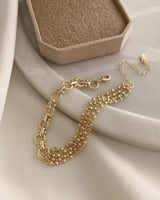 سوار بتصميم سلاسل متعددة مطلي ذهب . MB-358