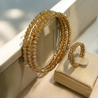 طقم سوار مع خاتم دوريكا مطلي ذهب عيار 22 - تصميم م...