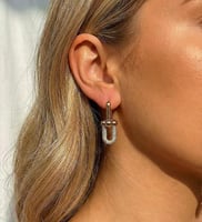 حلق بتصميم مستوحى من تيفاني مع حلقة مرصعة بالزركون...