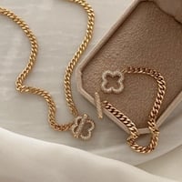 طقم مطلي ذهب من قطعتين مع قفل بشكل وردة MS-002