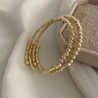 سوار مرن من الكرات الذهبية مطلي ذهب. MB-199