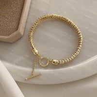 سوار صلب مفتوح مع قفل دائري مطلي ذهب. MB-208