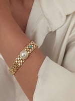 سوار بيسمارك مع حجر لولو في الوسط مطلي ذهب. MB-223