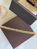 سوار مطلي ذهب بتصميم انيق مرصع بالزركون اللامع . M...