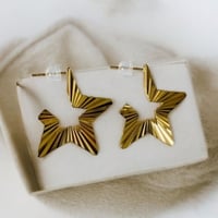 أقراط أذن موديل نجمة مطلي ذهب. ME-038