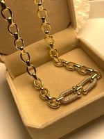 سلسلة جنزير مع حلقتين متداخلتين مطلي ذهب. MN-040