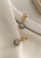 أقراط أذن بشكل عين زرقاء مطلي ذهب. ME-031