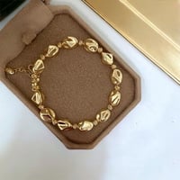 سوار بشكل احجار مطلية ذهب . MB-116