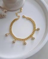 سوار جنزير مع تعليقات كروية مرضعة بالزركون مطلي ذه...