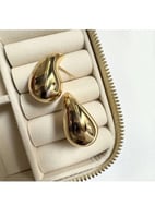 أقراط أذن بشكل قطرة ماء معلقة لون ذهبي. ME-025