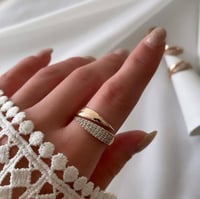 خاتم مفتوح نصفه مرصع بالزركون مطلي ذهب عيار ١٤ ( ا...