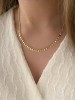 سلسال مطلي ذهب عيار ١٤ ناعم مع تعليقات بشكل دوائر...