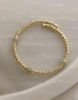 سوار مرن مع ثلاث كرات ذهبية مرصعة بالألماس مطلي ذه...